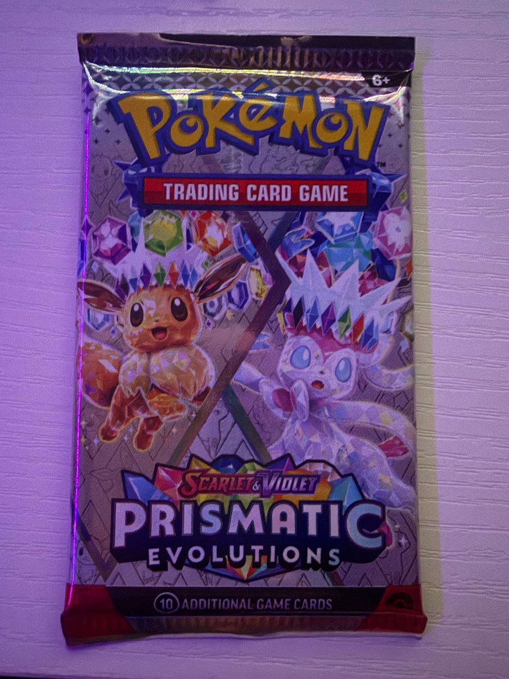 Scarlet & Violet Prismatic Evolutions Sealed Booster Pack - 10 Cards, 1 pack